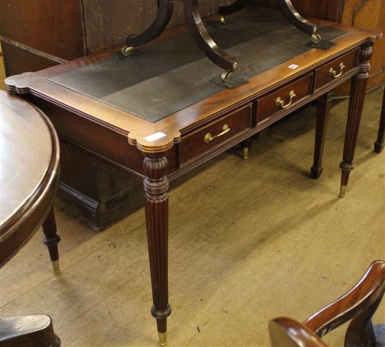 3 drawer mahogany writing table on reeded legs